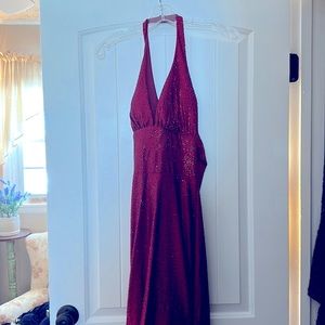 Stunning red beaded prom dress with train and bustle.